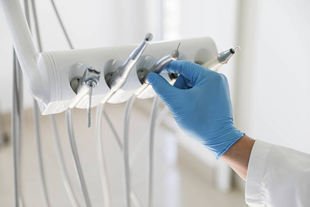 Professional Tooth Extraction technician working in Midlothian, IL